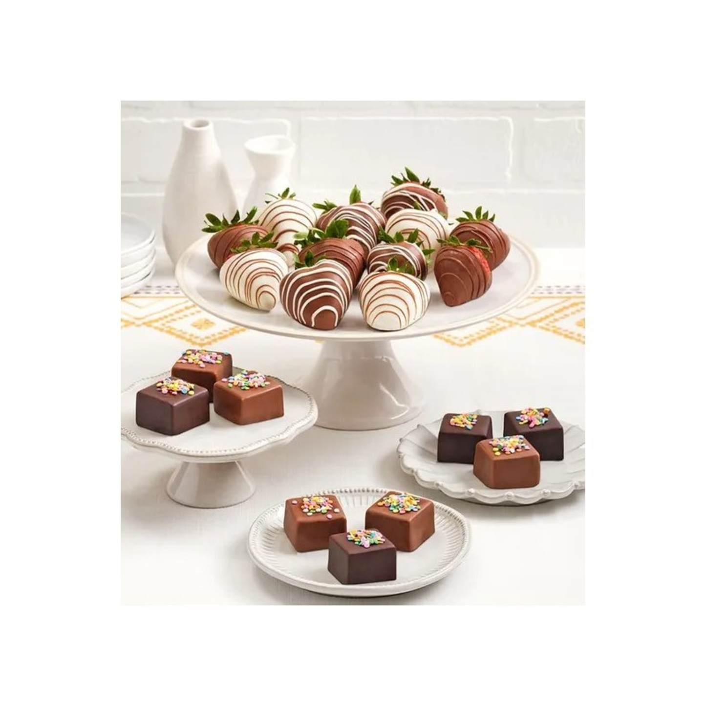 CELEBRATION™ CHEESECAKE BITES WITH DRIZZLED BERRIES